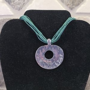 PENDANT  silver tone.